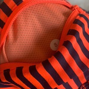 Lululemon navy and bright orange leggings